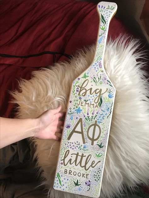 21st Birthday paddle #alphaphi #sorority #biglittle #paddle #craft #sororitycrafts #aphi #21stbirthday #flowers #painting #greek Pink Paddles Sorority, Pastel Sorority Paddle, Floral Paddle Sorority, Flower Paddle Sorority, Sorority Paddles Aesthetic, Sorority Paddles Flowers, Paddles For Big Sorority, Sorority Big Paddles Ideas, Pledge Mom Paddle Sorority