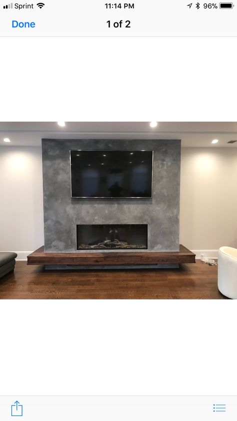 Tv Mounted Over Wood Fireplace, Wall Mount Fireplace Under Tv, Linear Fireplace With Hearth, Floating Concrete Hearth, Concrete Indoor Fireplace, Concrete Tv Wall, Wall Mounted Mamtel Fireplace, Cabin Fireplace Ideas, Fireplace Tv Wall Barnwood