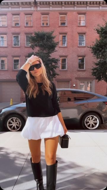 Brittany Sansone on Instagram: "NYFW 
Bring your bubble skirt & dresses into fall 
Comment ✨SHOP✨ to have links & sizing sent straight to you 
#nyfw #styletips #wiw #ootd #" White Dress And Boots Outfit, White Dress With Sweater Outfit, Bubble Skirt Outfit Fall, Mini Skirt Tall Boots Outfit, White Boots Fall Outfit, Sweater Dress Outfit Nyc, Fall Bubble Skirt Outfit, Bubble Skirt Fall Outfit, Bubble Skirt Dress