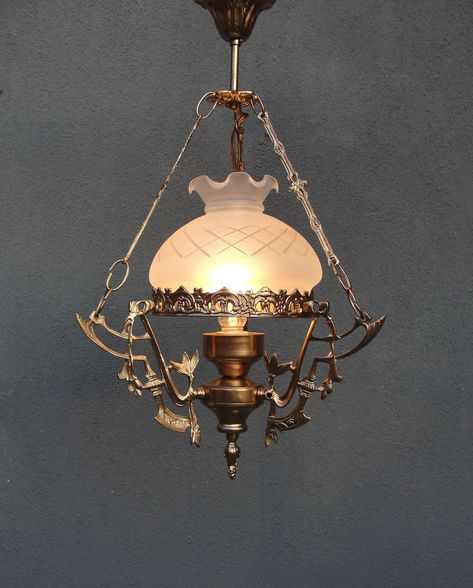 This beautiful art deco style/ colonial style chandelier lamp will make a statement in your home and gives a beautiful effect. It is a great vintage piece of high quality, very heavy and full of great details, made in the 1950's. This lamp was made in Turkey. The glass is original. It will come ready to hang, rewired and tested. It is 22'' (56 cm) high, 13'' (33 cm) deep and 13'' (33 cm) wide, a great piece for any room. Two shipping options: Registered mail by ground can take 15 uptil 40 days, is cheaper and safe but slow. TNT which takes 5-7 days to arrive. PLEASE LEAVE YOUR PHONE NUMBER DURING CHECKOUT if you want this option. TNT is fast and is trackable online.  Due to the size this item can not be shipped combined with other items, unless very small. --------------------------------- Small Vintage Chandelier, Colonial Lamp, Antique Ceiling Lights, Vintage Brass Chandelier, Vintage Ceiling Light, Antique Brass Chandelier, Lampe Vintage, Aladdin Lamp, Antique Light Fixtures