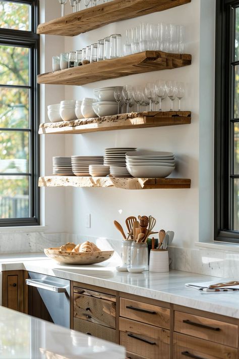 Open shelving is making a comeback in kitchen design, offering a stylish way to display decorative items and everyday dishware. This trend makes kitchens feel more open and inviting, perfect for those who love to showcase their style. Get inspired to integrate open shelves into your kitchen for a blend of functionality and aesthetic appeal. White Kitchen Cabinets Open Shelving, Exposed Kitchen Shelves, Open Shelves Kitchen Styling, Kitchen With Shelves Instead Of Cabinets, Open Kitchen Shelves Styling, Open Wood Shelves Kitchen, Open Cabinet Kitchen, Small Kitchen Open Shelving, Wooden Kitchen Shelves