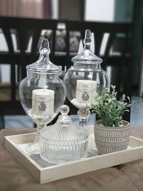 Center Piece For Living Room Glass Table, Big Glass Bowl Decor Ideas, Glass Basket Decor Ideas, Clear Glass Bowl Decor Ideas, Kitchen Island Decor Glass Jars, Glass Kitchen Table Decor, Glass Centerpiece Tray Dining Room Table, Glass Containers Decoration, Glass Kitchen Tables