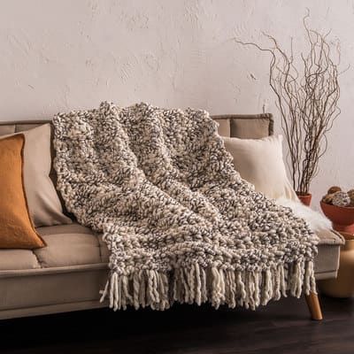 Bernat® Blanket Big Bold™ Bernat Crochet Fringed Throw | Projects | Michaels Modern Afghan Crochet Patterns, Chunky Crochet Throw Blanket, Bernat Blanket Patterns, Chunky Crochet Throw, Super Chunky Blanket, Wood Crochet Hook, Crochet Bed, Knit Afghan, Plaid Crochet