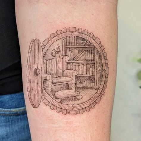 The Librarianologist | I know we've had a few tattoo posts in here, but had to share my new bookish addition | Facebook Banned Book Tattoo, Realism Book Tattoo, Pile Of Books Tattoo, Library Tattoo Book Lovers, Hobbit Hole Tattoo, Bookshelf Tattoo, Book Tattoo Sleeve, Library Reading Nook, Library Tattoo