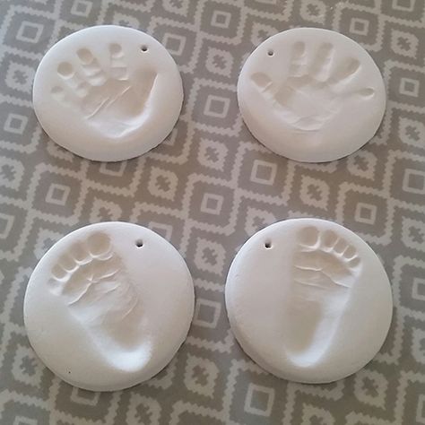 4 white clay hand and footprints to hang Baby Clay Handprint Ideas, Air Dry Clay Handprint, Clay Impressions, Baby Hand And Foot Prints, Clay Handprint, Baby Handprint, Diy Air Dry Clay, Air Dry Clay Projects, Clay Hand