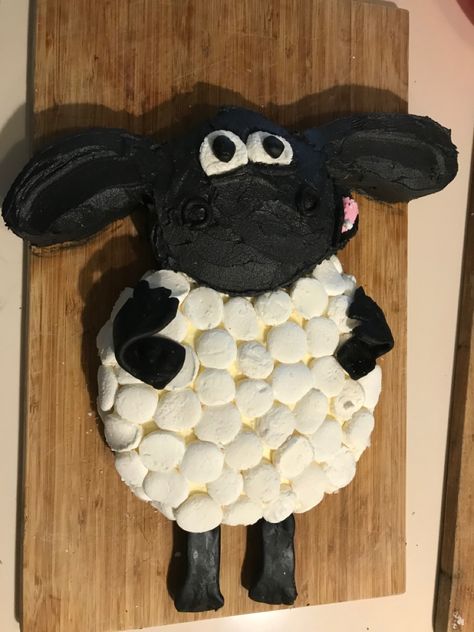 Chocloate cake with buttercream, marshmallows and soft liquorice. Timmy the sheep from Shaun the Sheep and Timmy Time Timmy The Sheep, Sheep Birthday Cake, Shaun The Sheep Cake, Sheep Cake, Timmy Time, Disney Jr, Cake With Buttercream, Shaun The Sheep, The Sheep