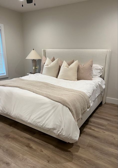 Image of aesthetic neutral upholstered King bed frame with side table and lamp from crate and barrel ~ interior design - beige furniture cream Cream Bed Headboard, Cream Bedframe Ideas, Cream Fabric Bed Frame, Beige King Upholstered Bed, Cream King Bed Frame, Off White Bed Frame, Beige King Bed, Cream And White Bed, Wayfair Bed Frame