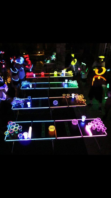 Glow Party Ideas Outdoor, Glow In The Dark Beer Pong, Glow Party Outdoor, Glow In The Dark Graduation Party Ideas, Outdoor Glow In The Dark Party, Glow In The Dark Graduation Party, Glow In The Dark Party Ideas Pool, Prom Activity Ideas, Glow Stick Pool Party