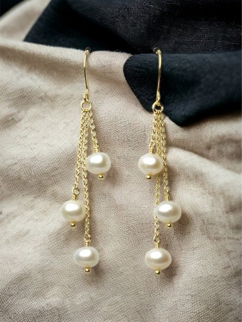 "A gorgeous and classy pair of pearl earrings with high quality freshwater pearls that will be great for your wedding day, as a gift for your bridesmaids or any special woman in your life! They look perfect with every colour and outfit! - Total length of the earrings: ~ 2.5 inches (6.5 cm)  - You can choose between solid sterling silver, 24k gold plated sterling silver or rose gold plated sterling silver. - All earrings are sent to you with silicon backs. PEARL PROPERTIES: * Offer optimism, vitality, wellness, health, longevity and strength. * Symbolize clarity in \"darkness\", wisdom, happiness, love and the good that lies within each person.  * Help us to get in contact with the simple and real things of life. * Offer peace, calmness, honesty, purity and integrity of character. SENDING A Pearl Properties, Pearl Dangle Earrings Wedding, Seed Bead Bracelets Tutorials, Jewelry Packaging Design, قلادات متدلية, Earrings Diy Handmade, Real Pearl Earrings, Diy Wire Earrings, Pearl Earrings Gold