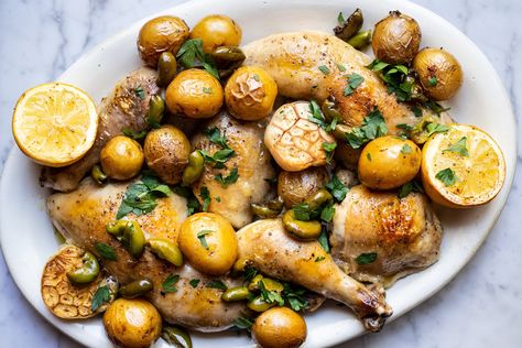 Olive-Oil Confit Chicken with Lemon, Potatoes, Green Olives + Herbs — Local Haven Confit Chicken, Chicken Confit, Confit Recipes, Chicken With Lemon, Lemon Potatoes, Herb Chicken, Stuffed Whole Chicken, Green Olives, Favorite Comfort Food