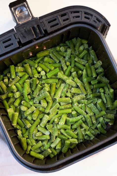 Air fryer frozen green beans can be made tender in no time. Use your Cosori or Ninja Foodi and a bag of frozen vegetables for this side dish. Frozen Vegetables In Air Fryer, Vegetables In Air Fryer, Air Fryer Frozen Green Beans, Cooking Frozen Green Beans, Cheap Side Dishes, Air Fried Green Beans, Crispy Green Beans, Air Fryer Cooking Times, Fried Green Beans