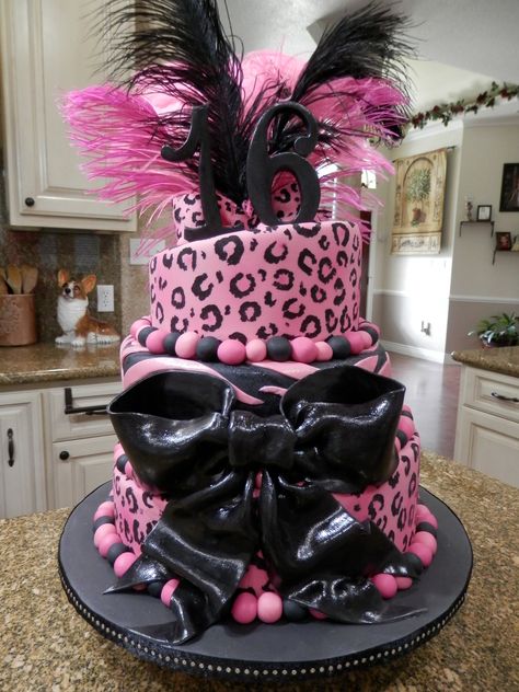 Sweet 16, Pink & Black, topsy turvy cake is all marbled cake w/ bc icing, covered in fondant w/ hand painted cheetah print and fondant zebra stripes.  :) 2000s Sweet 16, Cheetah Print Cake, Pink And Black Cake, Black And Pink Cake, Pink Cheetah Print Cake, Pink Leopard Cupcakes, Pink Leopard Birthday Cake, 2000s Birthday Party Theme, Buttercream Cheetah Print Cake