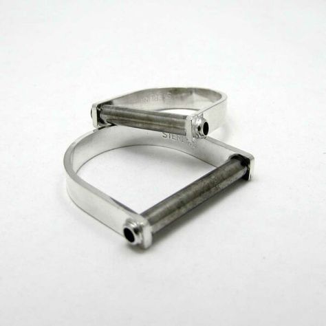 An industrial and eye catching design giving a new definition to a statement ring. The band is 3.5mm wide and polished with a blackened sterling silver cylinder bar. Due to the handmade nature of the creation, each piece may have slight variations Modern Silver Ring, Silver Bar Earrings, Gold Rings Stackable, Bar Ring, Geometric Ring, Modern Ring, Solid Gold Rings, Brown Leather Strap, Silver Bars