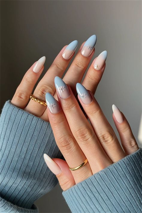 Embrace the beauty of Winter with these simple nail ideas that perfectly reflect the season's charm. Try a minimalist design featuring soft, icy blue polish paired with delicate white snowflakes or silver glitter tips. This chic yet understated look will elevate your winter wardrobe and keep your nails stylish and fresh. Perfect for cozy nights in or festive gatherings! Explore more winter-inspired designs and share your favorite. Ombre Snowflake Nails, Light Blue Ombre, Simple Nail Ideas, Cozy Winter Vibes, Glitter Tips, Blue Polish, Winter Inspired, Snowflake Nails, Blue Nail Designs