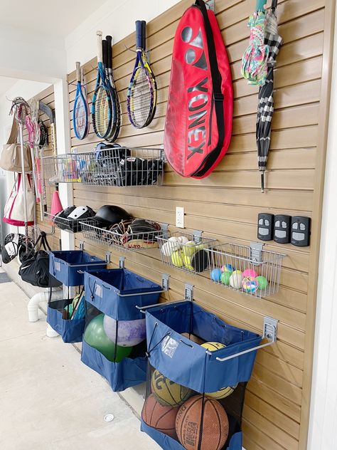 Sports Equipment Storage Ideas, Equipment Storage Ideas, Slat Wall Storage, Garage Wall Organizer, Outdoor Toy Storage, Sports Equipment Storage, Stroller Storage, Garage Wall Storage, Garage Systems