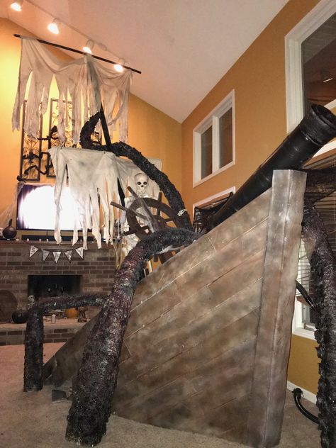 Halloween sunken pirate ship with kraken Pirate Ship Halloween, Pirate Ships Diy, Diy Pirate Ship, Sunken Pirate Ship, Pirate Halloween Decorations, Spook Houses, Pirate Halloween Party, Pirate Props, Diy Pirate