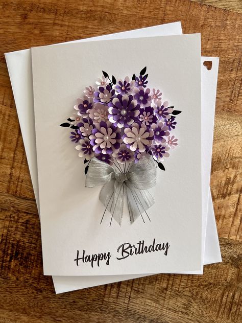 3D Handmade Card Purple Bouquet A5 format. All my cards have been designed by myself and I pay great attention to details. You can request any greeting on the front of these cards also I can include a personal gift message inside the card.    Contains: - 1 white card 300gsm, size A5 - 5.8*8.3 inch (15cm * 21cm), - 1 message blank 300gsm, - 1 white envelope 100gsm. NOTE: Since this is all handmade, the one you get might be slightly different from the photos. Handmade with love By Lucy Designs...by me ❤️ Birthday Card Decorations Ideas, Project Flower Design, Designs For Greeting Cards, Cards Flowers Handmade, Envelope Birthday Cards, Fancy Birthday Cards Diy, Beautiful Birthday Cards Diy, Purple Cards Handmade, Purple Handmade Cards