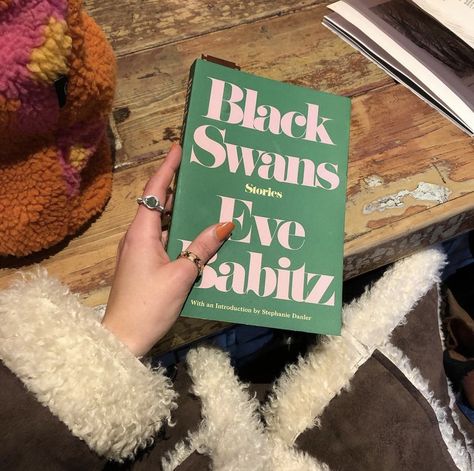 book recommendation, eve babitz, rings, cool books, academia, black swans, sherpa jacket Black Swan Book, Eve Babitz, Black Swans, Age Of Aquarius, Fallen In Love, Girl Things, The Secret History, First Story, Girl Reading