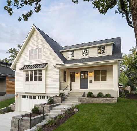 Andrea Rugg Photography | New white house with tuck under garage on sloped site - Andrea Rugg Photography Tuck Under Garage, Porch Stain, Garage Under House, Split Level House Exterior, Sloping Lot House Plan, Gardens Photography, Slope House, Interiors Photography, Photography Location