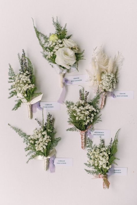 the boutonnieres for the man on the day with bunny tale, white fern and baby breath all in white yet varying in color and texure. An array of boutonnières were for his entourage. White Wildflower Boutonniere, Baby Breath Boutonniere, Tivoli Wedding, Simple Boutonniere, White Bridal Flowers, Prom Bouquet, White Boutonniere, Mini Calla Lilies, Green Wedding Flowers