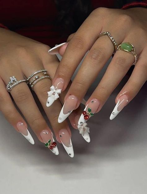 Cherry Nails With Gems, Long Almond Nails With Gems, Cute Almond Christmas Nails, Almond Shape Nails Christmas, Red Christmas Almond Nails, Cherry Gem Nails, Long Almond Christmas Nails, Stiletto Nails With Charms, Cherry Charm Nails