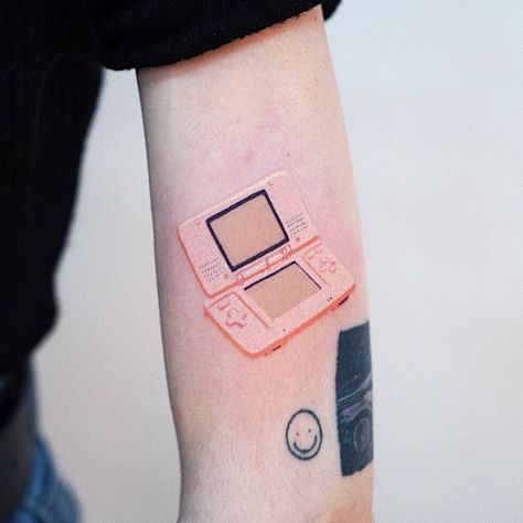 Nintendo Ds Tattoo, Pink Nintendo Ds, Small White Tattoos, Geek Tattoos, Nintendo Tattoo, Pink Nintendo, White Tattoos, Geek Tattoo, Kawaii Tattoo