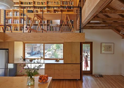 Gorgeous farmhouse kitchen in wood with mezzanine level above House With Mezzanine, Villa Mairea, Furniture Wheels, Mid Century Modern Sideboard, Contemporary Kitchens, Stainless Steel Countertops, Fisher Paykel, Cabin Ideas, Island Home