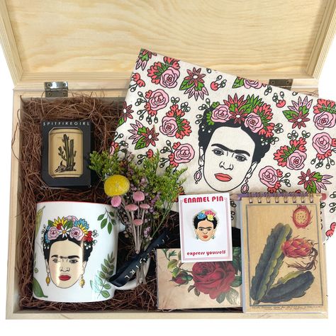 If you're looking for the perfect spirited gift for someone who absolutely adores Frida Kahlo, look no further. This gift box is packed with Frida Treasures. Box includes: Frida zipper pouch Cactus Votive Fancy Matches Frida Coffee Mug Cactus decorated wood notepad and pencil Frida Kahlo enamel pin Flower bouquet For something extra special add the Frida Earrings Frida Kahlo Home Decor, Frida Earrings, Frida Kahlo Gifts, Spirit Gifts, Makeover Bedroom, The Lover, Room Makeover Bedroom, Business Card Holders, Wood Boxes