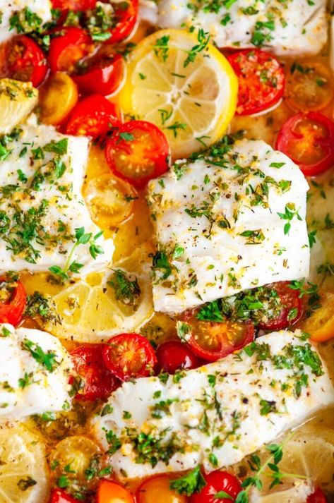 Lemon Herb Butter Baked Cod - Fresh cod fillets baked with cherry tomatoes and smothered in a lemon garlic herb butter sauce. From aberdeenskitchen.com #herb #lemon #butter #cod #baked #fish #seafood #tomatoes #maindish #dinner #recipe #glutenfree Garlic Herb Butter Sauce, Lemon Butter Cod, Butter Baked Cod, Cod Baked, Baked Cod Fillets, Lemon Herb Butter, Butter Cod, Herb Butter Sauce, Baked Haddock