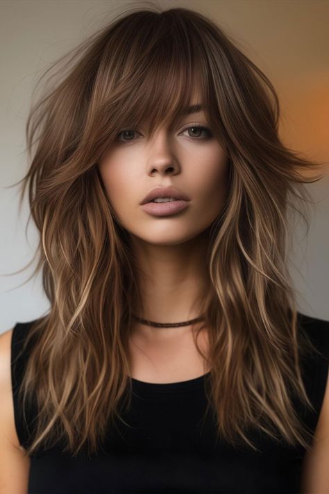 8. Chestnut Shag with Wispy Fringe This chestnut shag haircut boasts rich, warm tones that complement the soft, wispy fringe and textured layers. The loose waves add movement and volume, creating a laid-back yet sophisticated look. Soft Fringe Long Hair, Fringe Layers Long Hair, Modern Brigitte Bardot Hair, Medium Wavy Shag Haircuts, Create Waves In Hair, Shaggy Hairstyles Medium, Shaggy Side Bangs, Modern Day Shag Haircut, Boho Shag Haircut