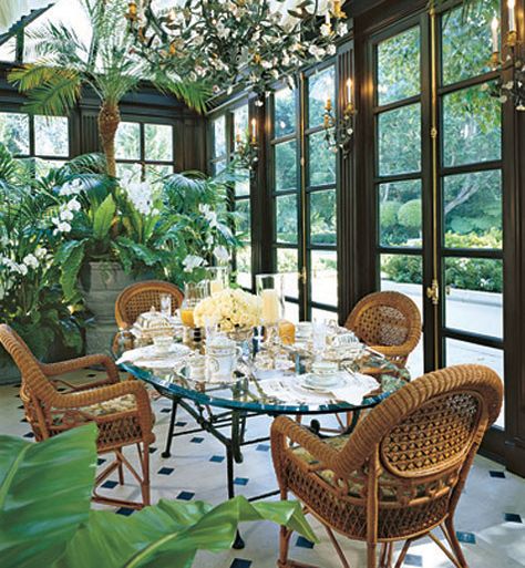 Built in 1913 for Burton E. Green, a founder of Beverly Hills, the home of Geoff and Anne Palmer received a thorough makeover from Los Angeles designer Craig Wright. The winter garden, a Neoclassical-style solarium that Wright conjured from an old plastic sunroom, is used as an informal dining area. | archdigest.com Sunroom Windows, Informal Dining, Sunroom Designs, Sunrooms, Wicker Chairs, The Dining Room, Neoclassical, Outdoor Rooms, Glass House