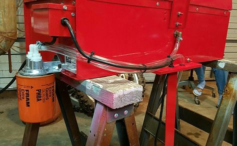 Oil filter mount added to barrel type parts washer. Barrel not shown. Unit is sitting on saw horses. Pump is also not visible. It is located at end of the red metal plate in the bottom right of pic. Saw Horses, Garage Workshop Layout, Workshop Layout, Metal Bending Tools, Metal Bending, Shop Tools, Garage Shop, Metal Works, Garage Tools