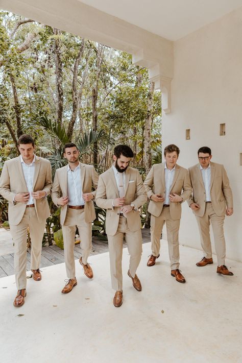 Bohemian Destination Wedding, Mens Tan Suit Beach Wedding, No Tie Wedding Groomsmen, Beige Groomsman Suit, Green Destination Wedding, Mexico Groomsmen Attire, Dark Khaki Suit Wedding, Fun Groomsmen Attire, Tan Groomsmen Suits With Green Bridesmaids