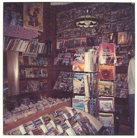 Here's an old photo showing a comic book store in 1980. On the rack are some of the Troubador Press books. Second from the top, and on the right, is Maze Craze 4. Comic Book Room, Comic Book Storage, Nerd Aesthetic, Old Comic Books, Comic Book Shop, Comic Book Store, Comic Store, Comic Shop, Old Comics