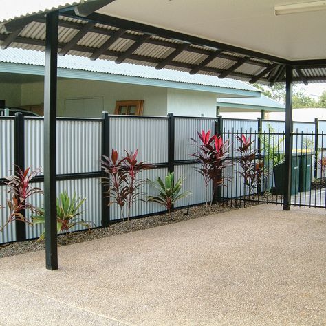 🚧 FANTASTIC FENCING🚧 ✨ Stylish fencing that has been designed and approved for use in areas with cyclonic conditions. Good Neighbour® Cyclonic Fencing is easy to install. Once the fence posts have been set in concrete, the fence sheets are easily placed into profiled steel tracks and posts✨ Click here to see our full range of Stratco fencing bit.ly/Stratcofencing 👈 Pin this to your dream fencing board 📌 #stratco #australia #howto #fencing #stratcofencing #landscaping #fenceinstallation Zinc Fence Ideas, Cyclone Fence Ideas, Black Cyclone Fencing, Foil Fencing, Unobtrusive Fencing, Cyclone Fence, Rural Dog Fencing, Good Neighbor, Fence Post