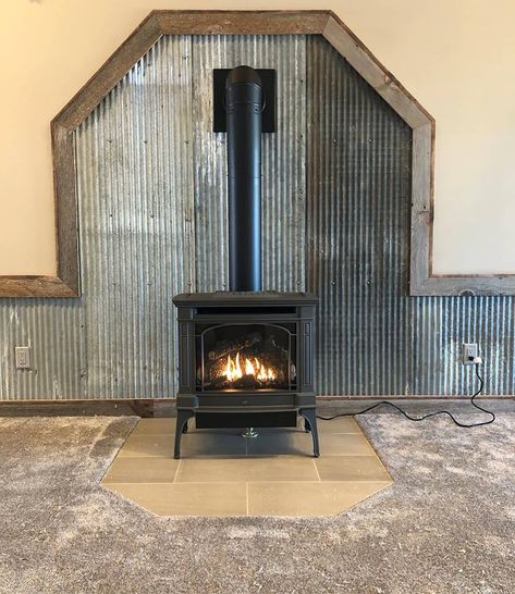 #murphysflooringandfireplaces #handyandy #oddjobrob #berkshire #fireplace #lopi #cozy #mancave #warm #flame #rusticfireplace #castiron Galvanized Tin Walls, Pellet Stove Hearth, Stove Surround, Gas Stove Fireplace, Wood Stove Surround, Dads Office, Barndominium Interior, Barn Tin, Rustic Decorating