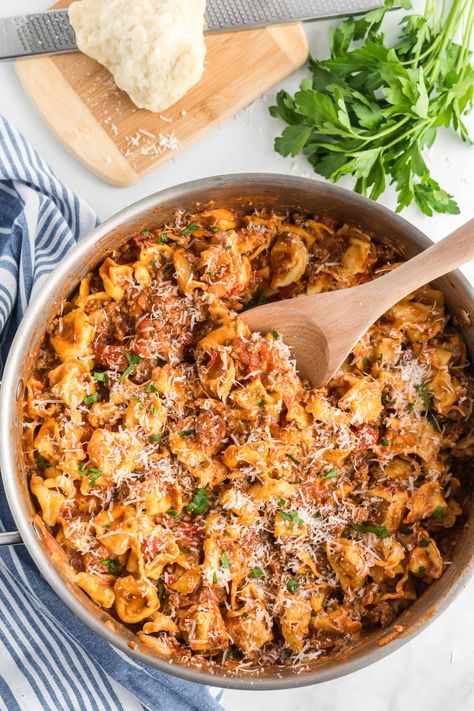 Turn a package of cheese tortellini into a delicious, satisfying meal in about 30 minutes. This Meaty Tortellini Skillet has a simple but super flavorful meat sauce and is topped with plenty of Parmesan cheese. #tortellini #onepotpasta #pasta #onepot #easydinnerrecipes #easydinner Tortellini Skillet, Stovetop Recipes, Potato Pasta, Tortellini Recipes, Stove Top Recipes, Pasta Dinners, Cheese Tortellini, Main Dish Salads, Skillet Meals