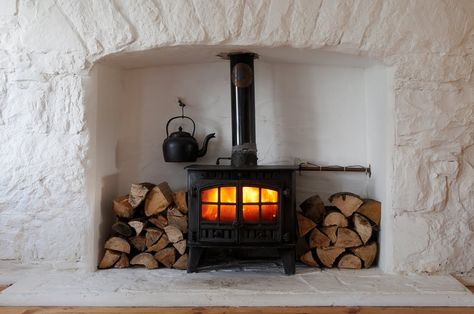 Irish cottage interior Irish Cottage Fireplace, Uk Cottage Interiors, Irish Fireplace, Modern Irish Cottage, Cottage Hearth, Irish Homes Interior, Irish Cottage Interiors, Wood Burning Furnace, Stove Hearth