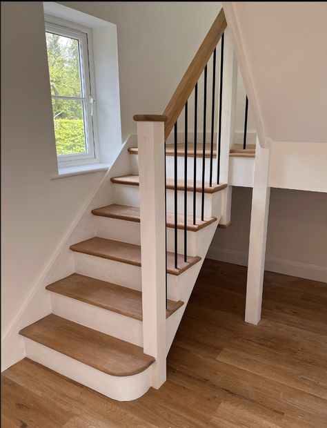 30 Best White and Wood Staircase Ideas For A Farmhouse Vibe Scandinavian Stairs Design, Whitewash Staircase, Modern Rustic Staircase, Oak And White Staircase, Small House Stairs, White And Wood Staircase, Stair Spindle Ideas, Wood Staircase Ideas, White Oak Stairs