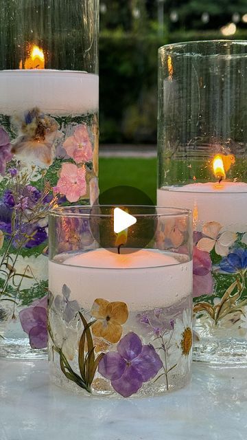 Leslie Saeta on Instagram: "DIY Pressed flowers are a beautiful and charming addition to any home decor.   I dried and pressed flowers from my backyard using a microwave flower press.   It only took only 60 seconds.   When made into candle holders, the flowers are stunning.  These delicate creations bring a touch of nature indoors and can be customized to fit any style or occasion.   Whether you want to create a romantic centerpiece, a whimsical decoration, or a unique gift, DIY pressed flowers are a fun craft.  Comment FLOWERS711 below and I will DM you the direct link.   https://my100yearoldhome.com/diy-pressed-flowers/" Pressed Flower Centerpiece, Resin Flower Crafts, Pressed Flowers Ideas, Diy Pressed Flowers, Candles With Dried Flowers, Home Made Candles, Microwave Flower Press, Pressed Flower Candles, Pressed Flowers Diy