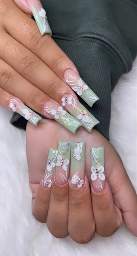 Acrylic Nail Designs Mint Green, Green Acrylic Nails With Butterflies, Spring Nails With Gems, Light Green Quince Nails, Quince Nails Butterfly, Nail Designs Quince, Spring Set Nails, Light Green And Pink Nails, Sage Green Quince Nails