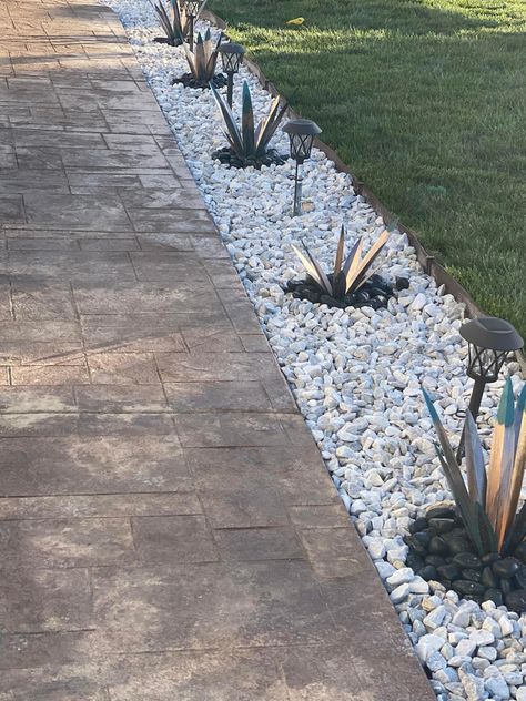 Grass Rock Border, White Rock Border Landscaping, River Rock Around Patio, Sidewalk With Rocks, Small Rock Landscaping Ideas, Driveway Rock Landscaping, Driveway Lined With Rocks, Rock Bed Plants, Succulent Backyard Ideas