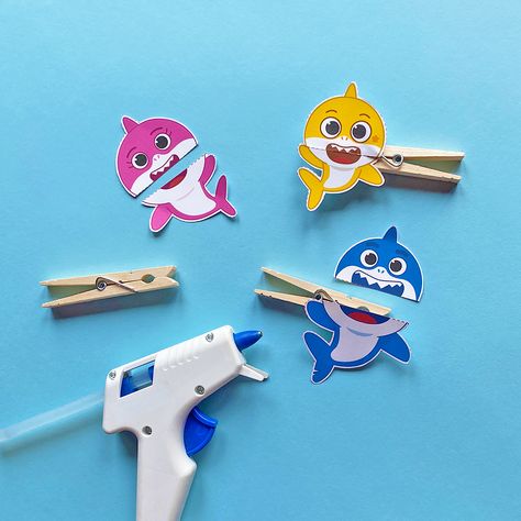 Printable Baby Shark Clothespin Puppets | Nickelodeon Parents Baby Shark Activities, Shark Clothespin, Toddler Artwork, Clothespin Puppets, Home Decor Ideas Paper, Shark Printables, Shark Puppet, Kindergarten Art Activities, Shark Activities