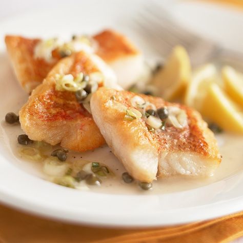 Lean snapper in a buttery lemon-caper sauce is a simple main dish, ready in just 30 minutes. Bean Ragu, Caper Butter Sauce, Potatoes Dishes, Charred Lemon, Caper Butter, Wilted Greens, Lemon Caper Sauce, Piccata Recipe, Seared Scallops