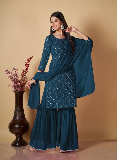 Party Wear Embroidery Worked Kurta With Sharara And Duppata Set Top Details : Shape :Round Work :Embroidery Worked & Sequnce Work Color :Navy Blue Fabric :Georgette Bottom Details : Style :Sharara Fabric :Georgette Color :Navy Blue Dupatta Details : Length :2.10 MTR Fabric :Georgette Color :Navy Blue Wash Care :Dry Clean Weight :700 Sharara Designs Party Wear, Sharara Suit Designs, Georgette Salwar Suit, Blue Sharara, Women's Party Wear, Embroidery Kurti, Sharara Designs, Georgette Dupatta, Salwar Dress