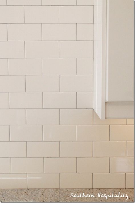 Subway tile backsplash w/Medium gray grout, called "Silver" from Lowes. White Subway Tile Kitchen, Gray Grout, Eames Design, Farmhouse Backsplash, White Subway Tile Backsplash, Grey Grout, Herringbone Backsplash, Subway Tile Kitchen, White Subway Tiles