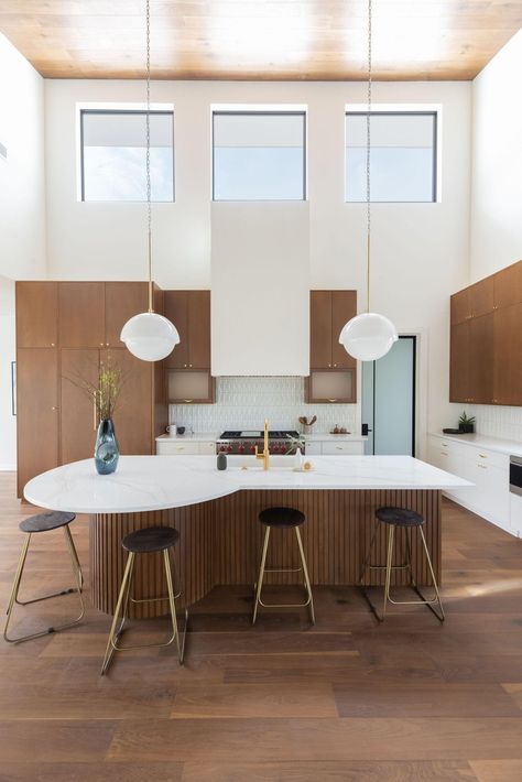 A midcentury masterpiece of a kitchen. With a slight touch of 70's warmth, we are loving every minute of this new build. #kitchengoals #dreamkitchen #organicmodern #modernkitchen | Build Nashville Mid Century Modern Kitchen Island, Modern Kitchen Pendants, Kitchen Wall Units, Modern Kitchen Island, Kitchen Cabinet Styles, Mid Century Modern Lighting, Mid Century Modern Kitchen, Kitchen Interior Design Modern, Mid Century Modern Interiors