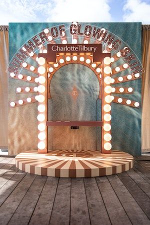 Charlotte Tilbury Summer Launch Party at Mondrian South Beach | 49 more photos on PartySlate Charlotte Tilbury Store, Photo Activation, Broadway Theme, 70s Disco Party, Selfie Wall, Mall Decor, Beauty Advertising, Window Display Design, Beauty Salon Decor