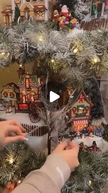 Daisy Sanchez on Instagram: "I want to try this ! I will see if i can. What a great idea for my Lemax Christmas village collection😍
📸C: @vanitymakeup
.
.
.
.
#christmas #christmastree #diy #hollyjolly #hygge #christmasdecor #snowytrees #winterpictures #snowy #seasonal #hyggeligt #decoration #decor #winterlover
#autumnwinter #cozy #snowweather #snow #warmandcozy #xmas #merrychristmas #christmasmood #everythingwhite #winterweather #sweaterweather #explore #fyp" How To Set Up A Christmas Village, Christmas Town Display Ideas, Ways To Display Christmas Village, Christmas Village Set Up Ideas, Christmas Village Train, Christmas Village Ideas, Christmas Village Display Ideas Diy, Christmas Village Display Ideas, Xmas Village