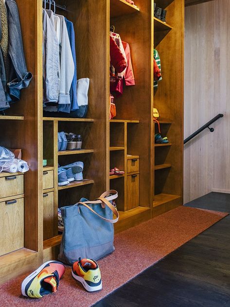 Big Branch Woodworking and Lackey Construction fabricated the cabinetry throughout the home, including the birch built-ins in the mudroom, designed by Jessica Helgerson Interior Design. Each family member has his or her own cubby with storage for coats, shoes, hats and gloves, with built-in outlets for charging iPhones. Jessica Helgerson Interior Design, White Shelving, Jessica Helgerson, Garage Entrance, 1950s House, Storage Wall, Wood Patio, Room Renovation, Mid Century Modern House